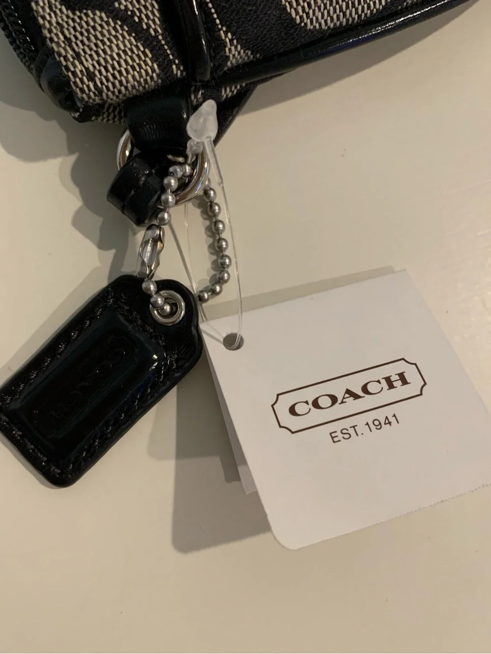 NWT - Coach Pattern Wristlet - Black and Gray